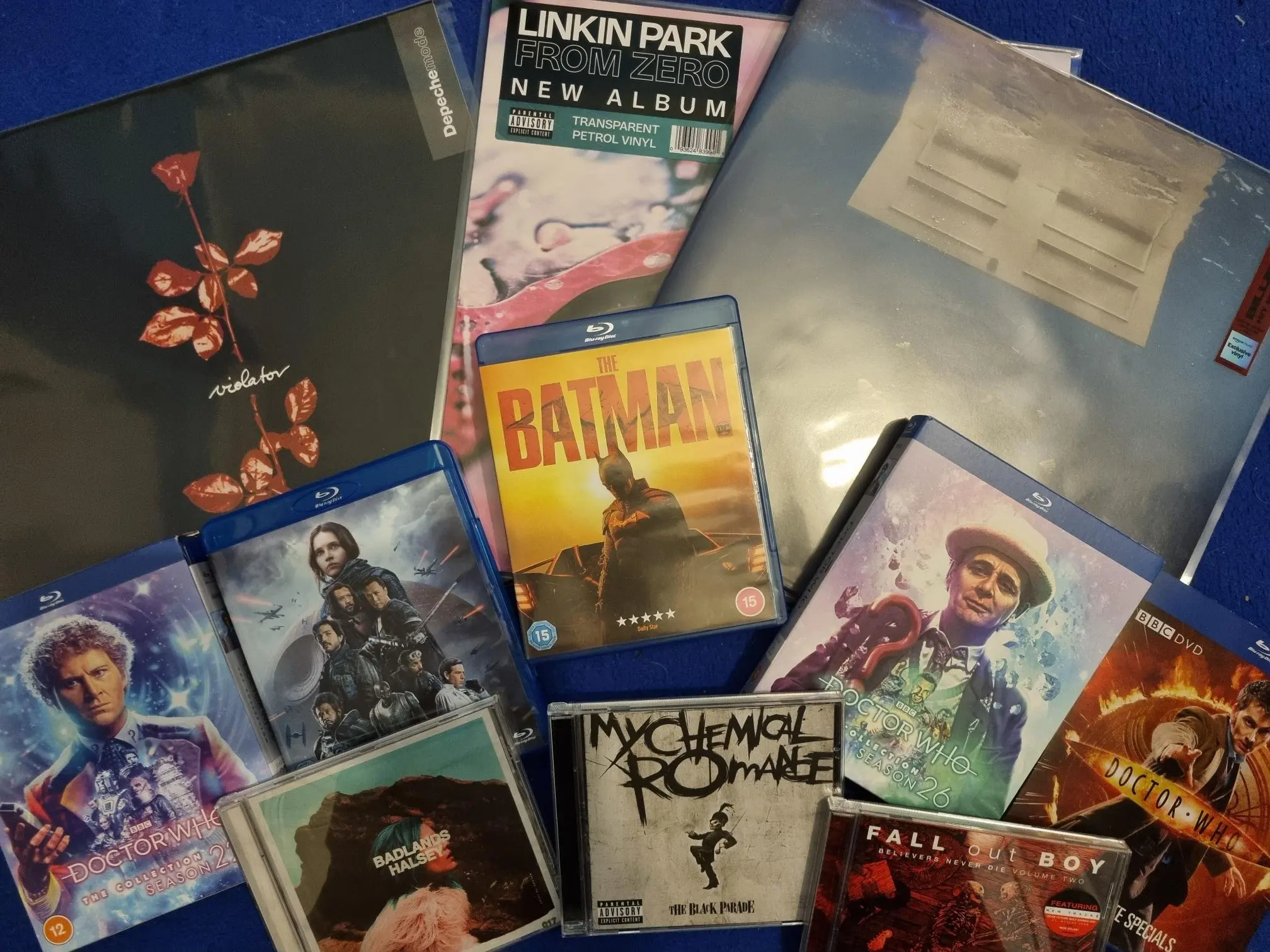 Photos of some types of physical media i collect: e.g. Blu-Ray, CDs, and Vinyl.