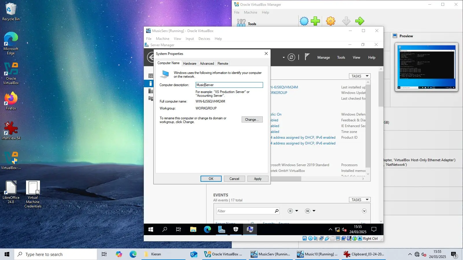 A screenshot of the System Properties window on a virtual machine, showing the computer name and network settings.